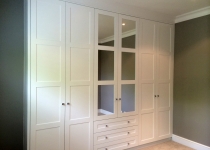fitted wardrobe with mirror inserts